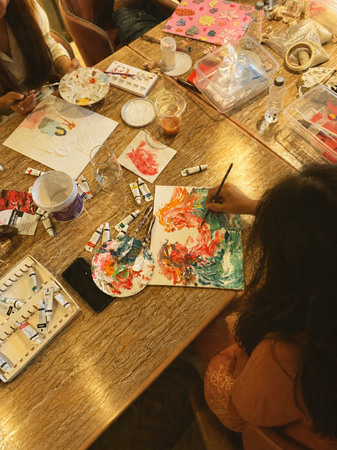 A member with their finished piece, The Art Nexus
